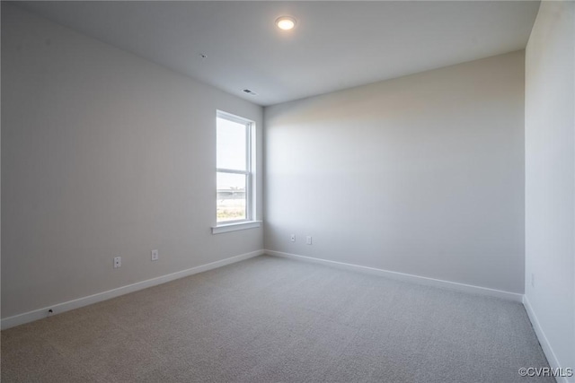 view of carpeted spare room