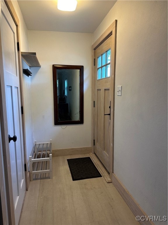 doorway to outside featuring light hardwood / wood-style floors