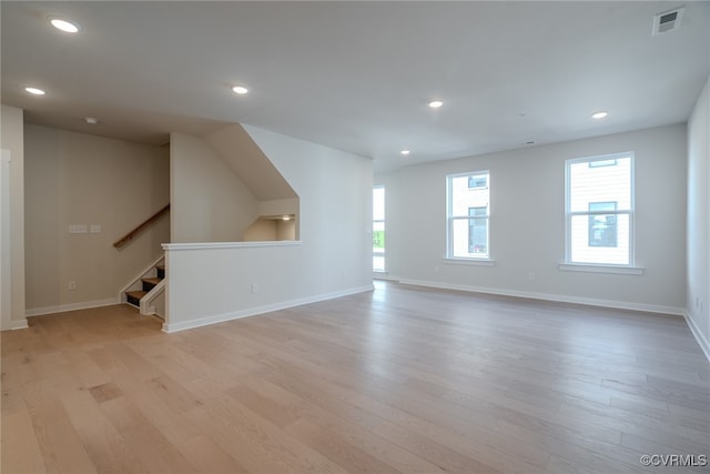 unfurnished living room featuring light hardwood / wood-style flooring