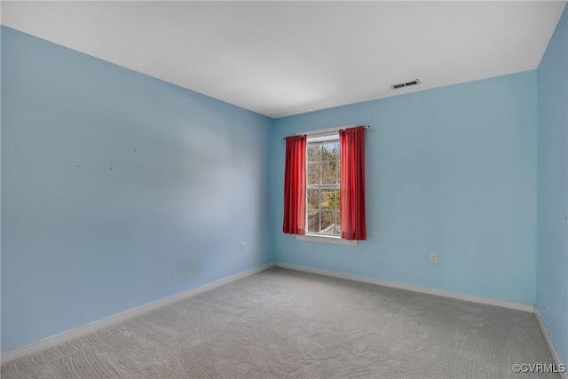 unfurnished room featuring carpet floors