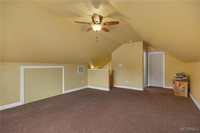 bonus room with ceiling fan, carpet floors, and vaulted ceiling