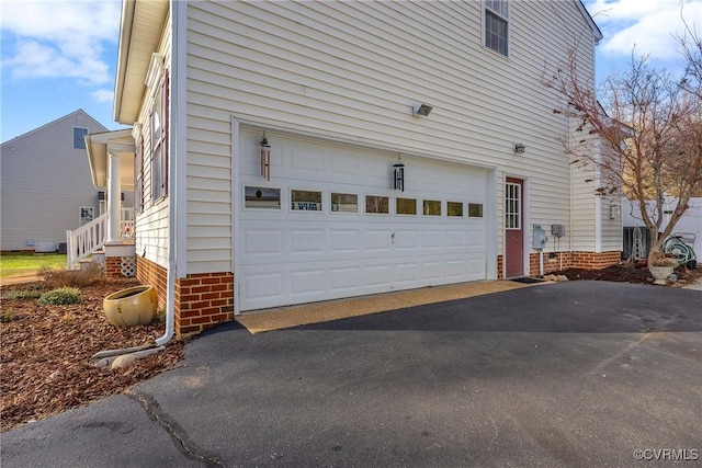 exterior space with a garage