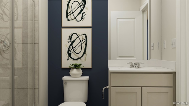 bathroom featuring toilet, tiled shower, and vanity