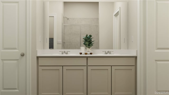 full bath with a sink, a tile shower, and double vanity