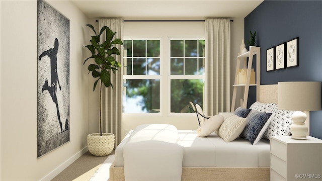 carpeted bedroom featuring baseboards