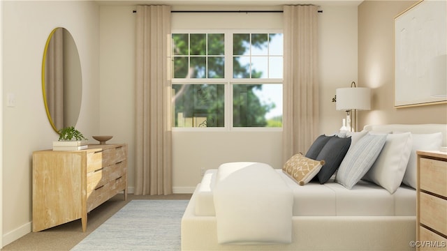 bedroom featuring carpet, multiple windows, and baseboards