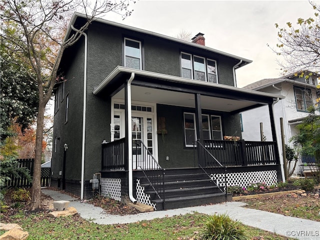 view of front property with covered porch