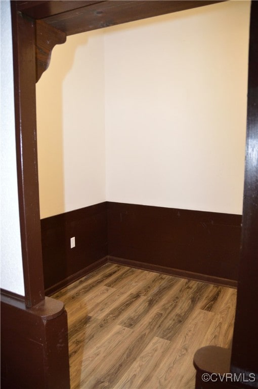 spare room with hardwood / wood-style flooring