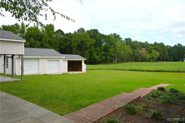 view of yard with a garage