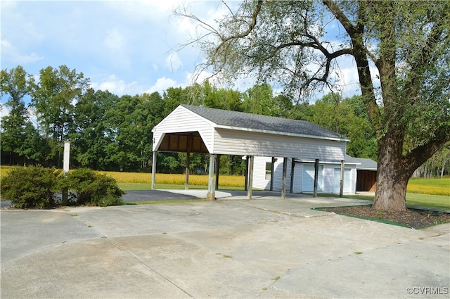 view of home's community with an outdoor structure