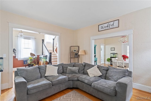 living room with light hardwood / wood-style flooring