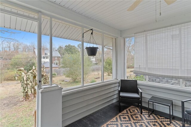 sunroom / solarium with ceiling fan