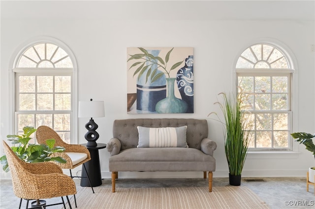 sitting room featuring a healthy amount of sunlight