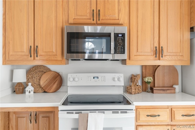 kitchen with white range with electric stovetop