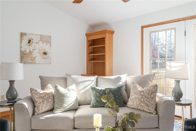 living room with hardwood / wood-style floors and ceiling fan