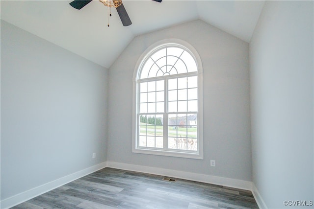 unfurnished room featuring hardwood / wood-style flooring, ceiling fan, and lofted ceiling