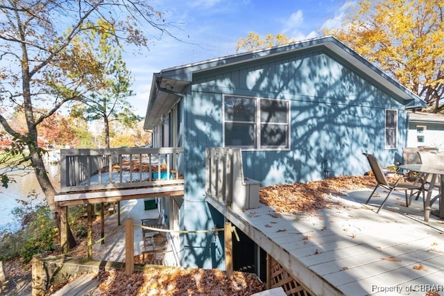 exterior space featuring a wooden deck