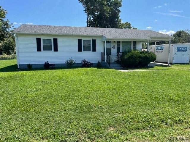 single story home with a front lawn