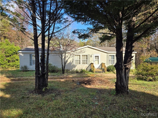 view of front of property with a front lawn