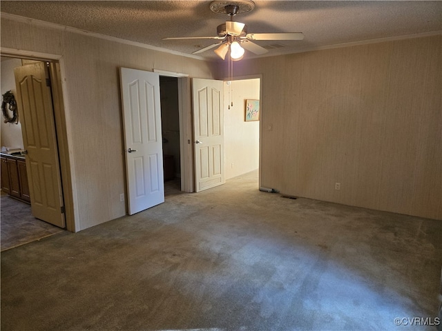 unfurnished bedroom with carpet and ceiling fan