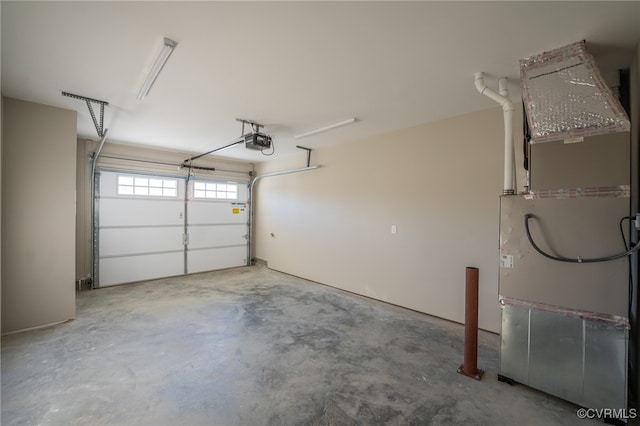 garage with heating unit and a garage door opener