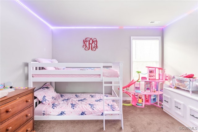 bedroom with light carpet