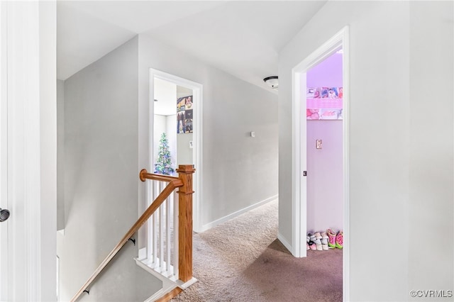 corridor featuring carpet flooring