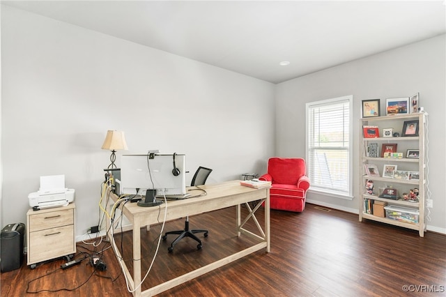 office space with dark hardwood / wood-style floors