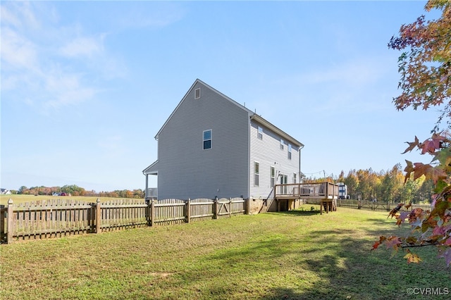 exterior space with a yard and a deck