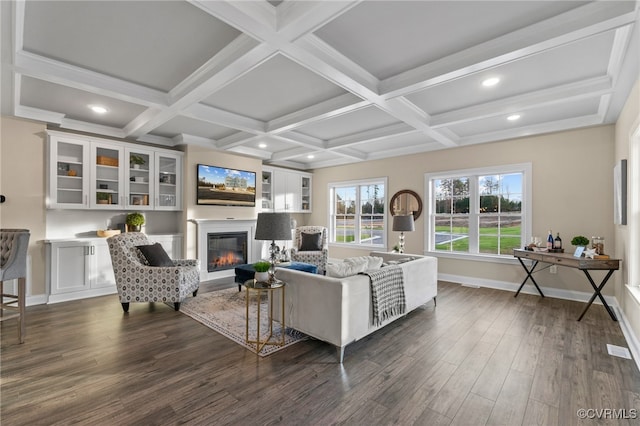 living room with beam ceiling, dark hardwood / wood-style flooring, and coffered ceiling