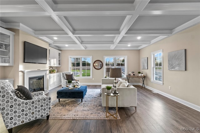 living room featuring crown molding, dark hardwood / wood-style flooring, beamed ceiling, and coffered ceiling