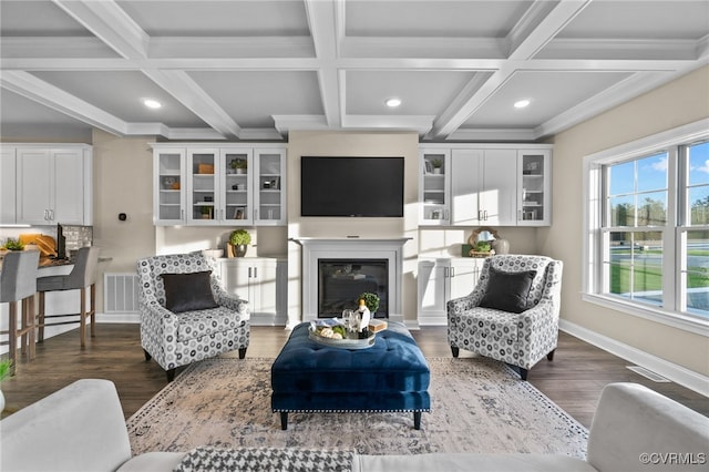 living room with beam ceiling, dark wood-type flooring, and coffered ceiling