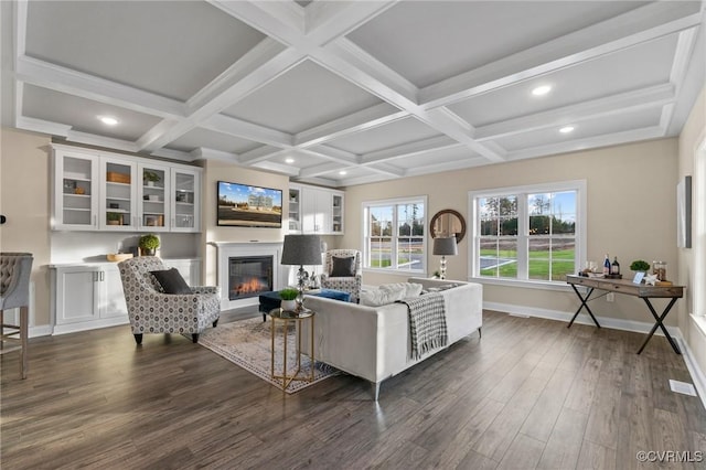 6416 Sanford Springs Cv, Midlothian, VA 23112 - living area featuring dark wood-style floors, a glass covered fireplace, coffered ceiling, recessed lighting, and beam ceiling