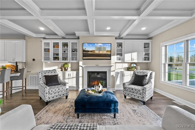 living room featuring beamed ceiling, dark wood-type flooring, and coffered ceiling