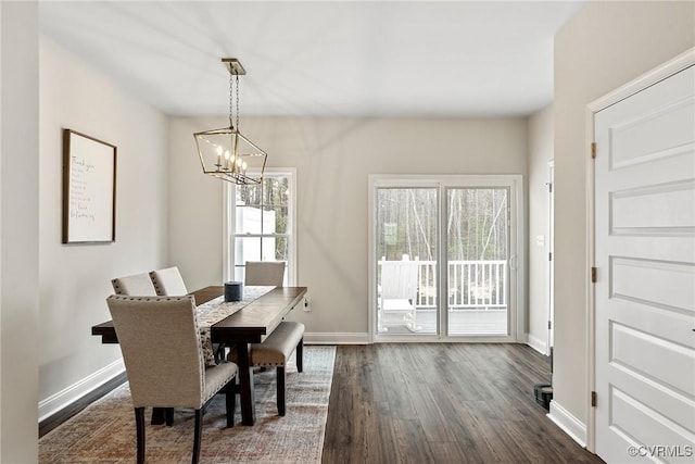6412 Sanford Springs Cv, Midlothian, VA 23112 - dining room featuring a chandelier and dark wood-style flooring