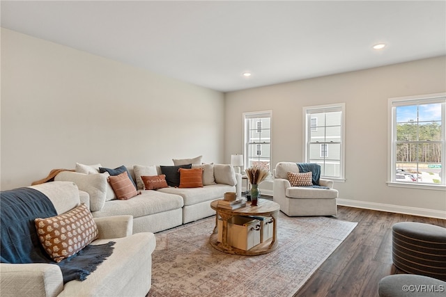 living room featuring dark wood-type flooring