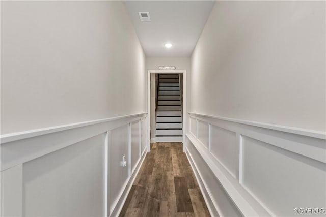 6412 Sanford Springs Cv, Midlothian, VA 23112 - corridor with dark wood finished floors, a wainscoted wall, recessed lighting, a decorative wall, and stairway