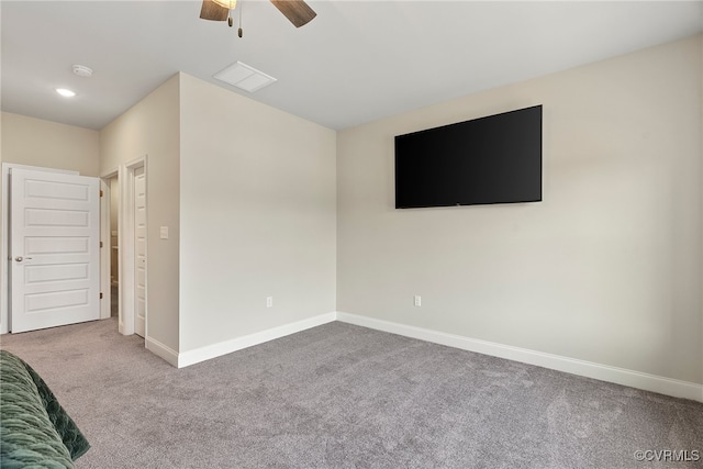 unfurnished bedroom with carpet floors and ceiling fan