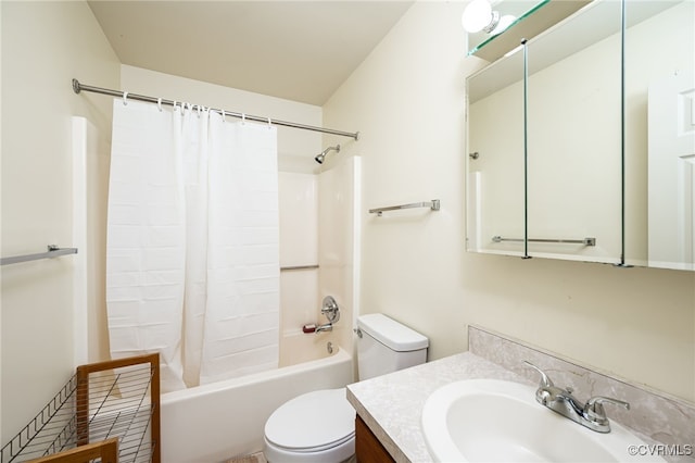 full bathroom featuring vanity, shower / tub combo, and toilet