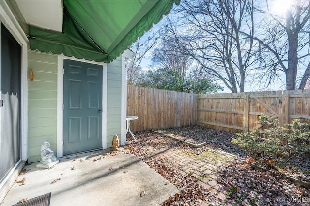 doorway to property with a patio area