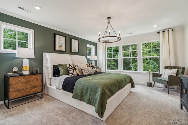 carpeted bedroom with visible vents, multiple windows, and crown molding