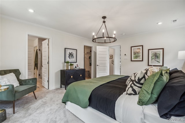 bedroom featuring visible vents, a notable chandelier, ornamental molding, light colored carpet, and a spacious closet