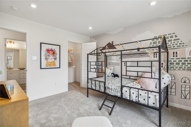 bedroom with recessed lighting, baseboards, and carpet