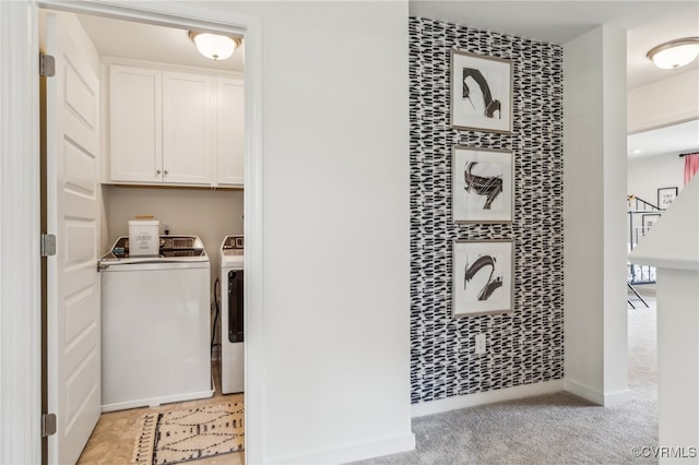 interior space with baseboards, light colored carpet, and independent washer and dryer