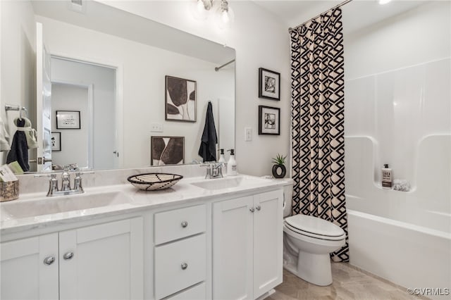 full bathroom with shower / bath combination with curtain, vanity, and toilet