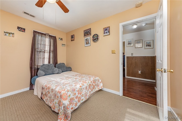 carpeted bedroom with ceiling fan