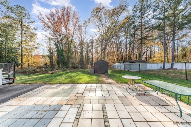 view of patio with a storage unit