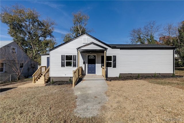 view of front of home with a front yard