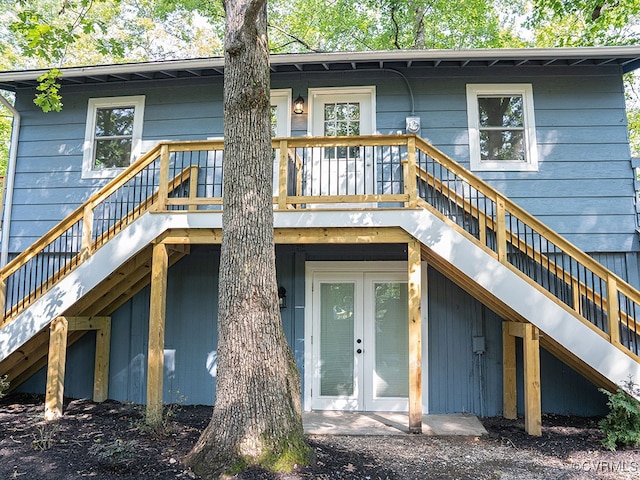 rear view of property with french doors