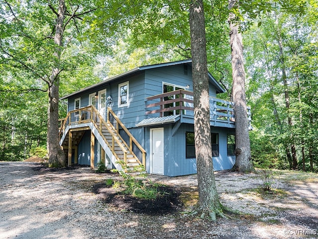 view of front of house with a wooden deck